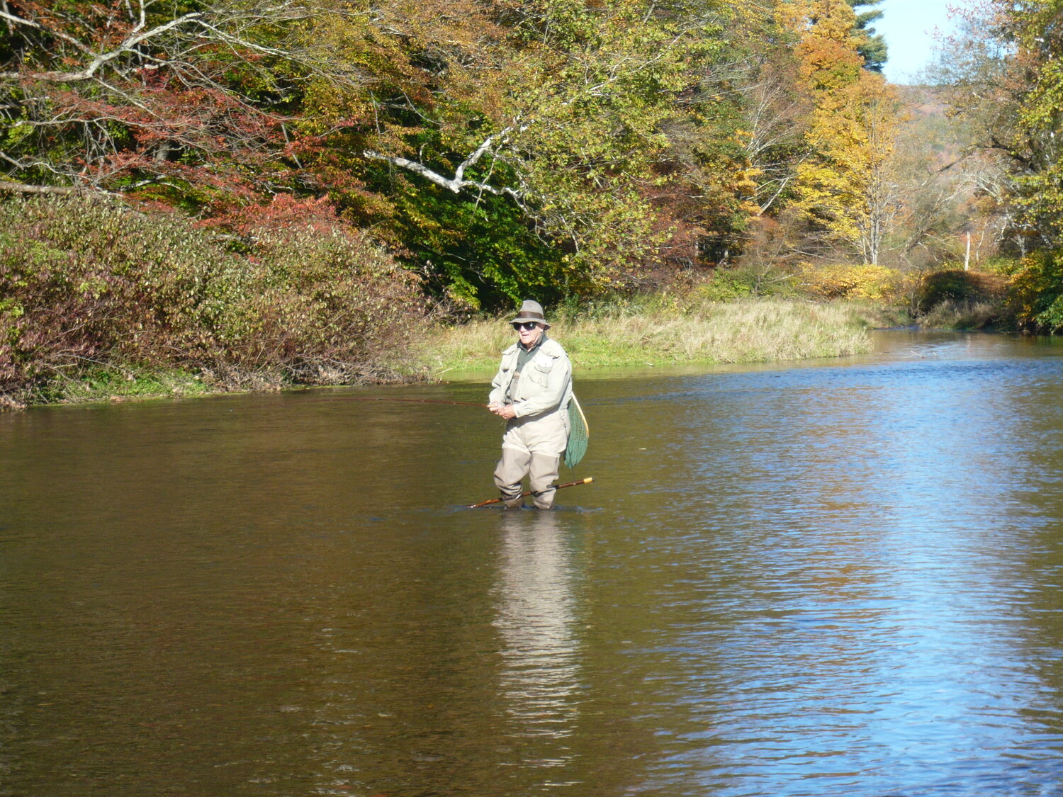 Roger, working a streamer fly at the head of "a favorite pool."